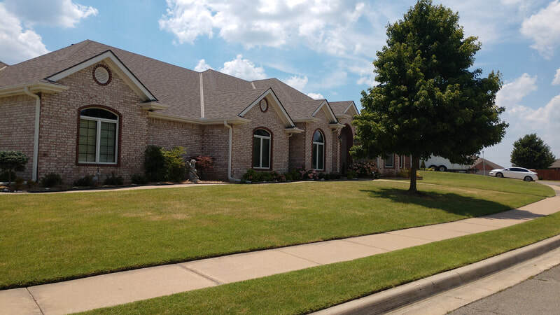 Beautiful corner lot. Sidewalk nicely edged